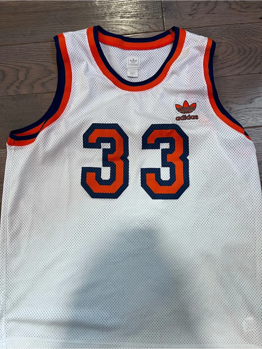 Vintage Patrick Ewing Knicks Basketball Jersey with Orange & Navy Accents #33